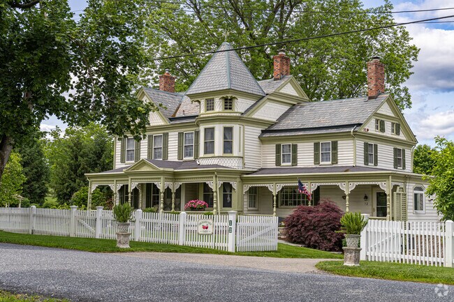 Buildings from the 1860s in Tewksbury showcase Italianate architecture, featuring belvederes, wide eaves, and elegant asymmetrical layouts.