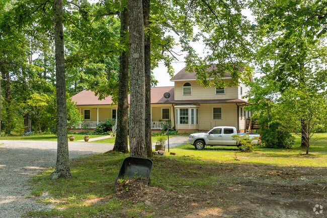 Explore traditional single-family homes nestled under the shade of mature trees in Columbia, VA.