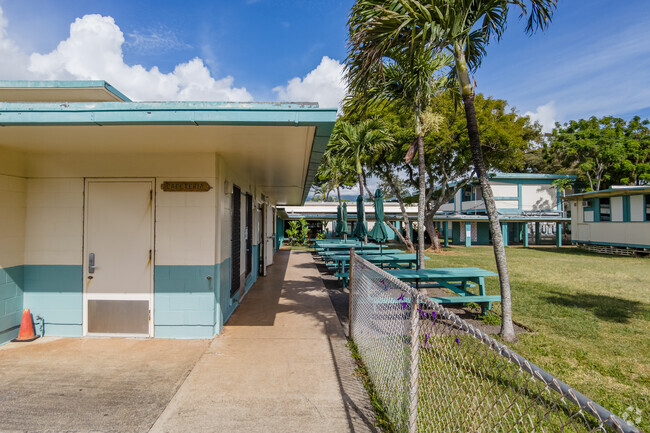 There are picnic benches lined up for the kids to enjoy lunch at Ka'ohao Public Charter School.