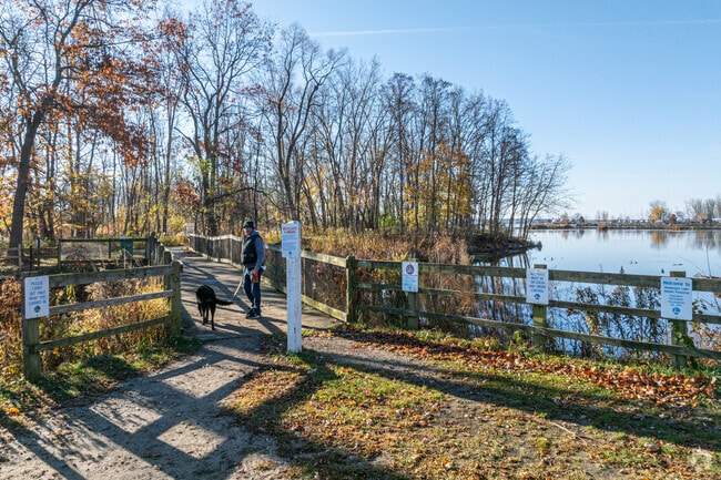 Lakeside trails offer peaceful walks with fall color near Laketon Township.