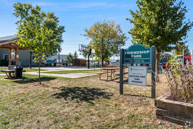 Enjoy a friendly game of basketball or let the kids explore the playground at Friendship Park.