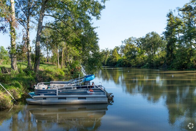 The docks along the bayou in Bayou Country Club offer scenic views and access to the water.
