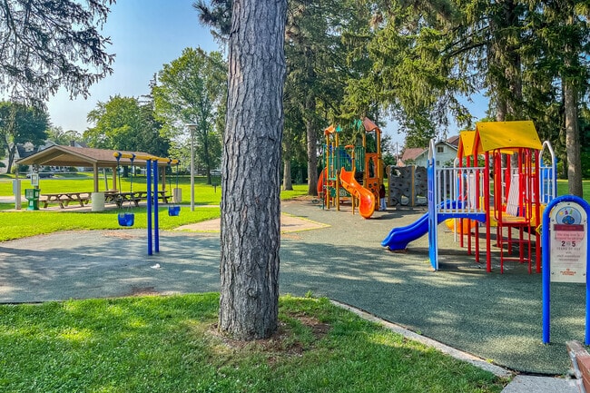 Residents spend time outside at the Temple playground.