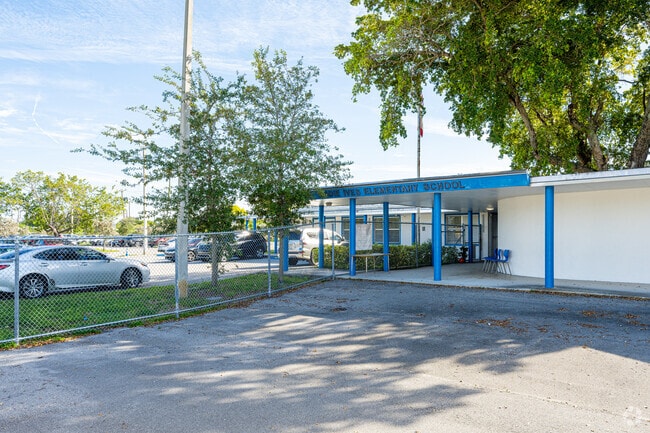 Madie Ives K-8 Preparatory Academy in North Miami Beach is accented in coastal blue paint.