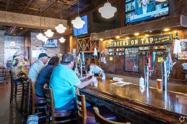 Sonoma Ranch East residents enjoy a slice of pizza at NYP Slice House Pizza.