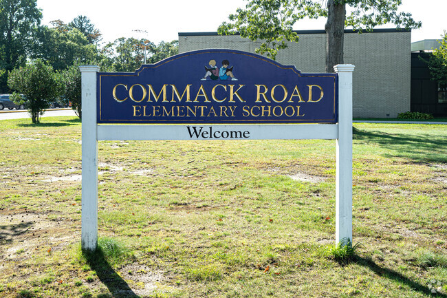 The main sign stands proud on the front lawn.