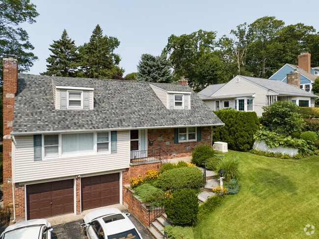 Beautiful Cape Cod style homes are found in Bayville's neighborhood.