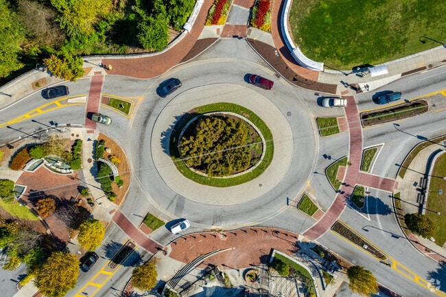 The traffic circle at Emory Village in Druid Hills serves as a central landmark and meeting point for the community.