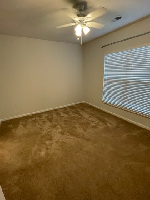 primary bedroom on lower level with ensuite bathroom