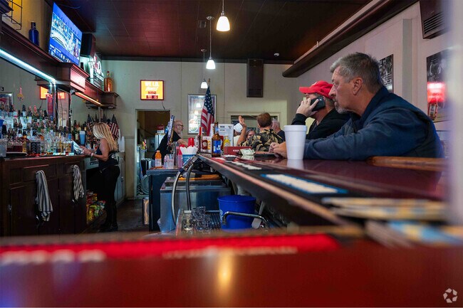 People enjoying a drink at the 5th Street Billiards Bar & Grill in Dupo, IL.