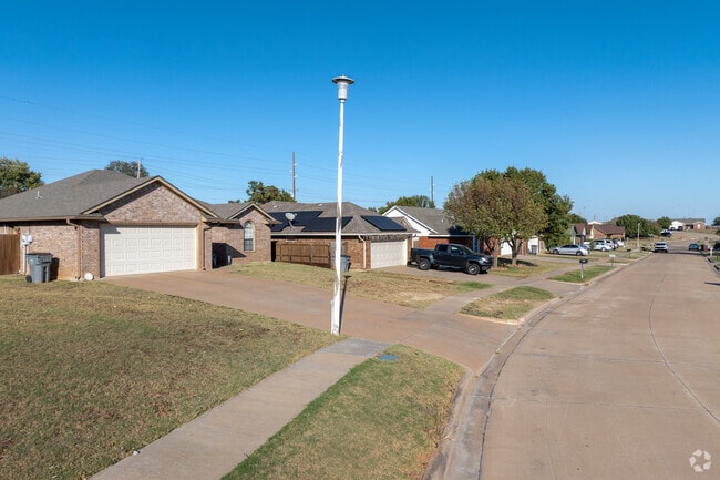 Many of the Sungate homes have paved sidewalk running through the yards.