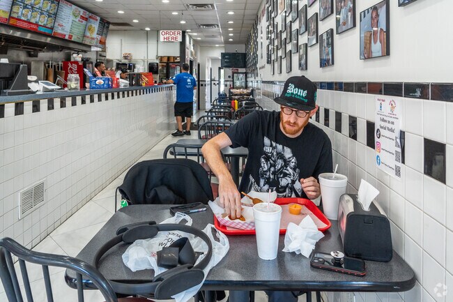 Enjoy a hotdog and fries at Dear Franks near Briarwood.