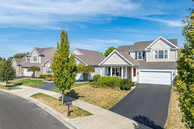 Hayden Farms subdivision in Tuttle West features New Traditional homes with attached garages.