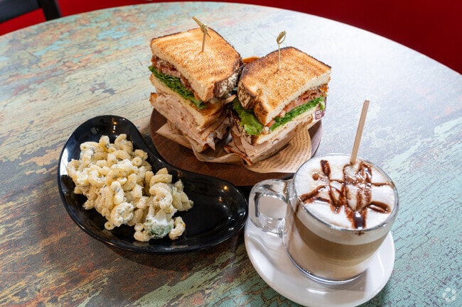 KB's Coffee House offers a supreme Turkey B.L.T. and Mac & Cheese finished with a hot Latte.
