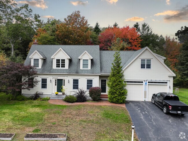 This colonial with dormered windows is typical in Stanwood Park.