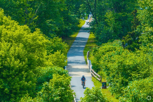 Enjoy the lush greenery as you travel along the Tri-Community Greenway near Lindenwood.