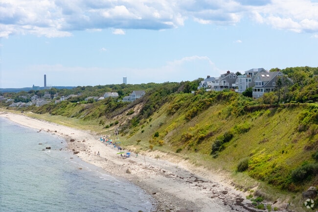 Waterfront homes sit on elevated lots near the bay.