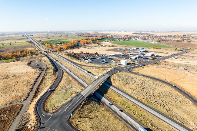 An interstate runs adjacent to a convenient truck stop near Cold Springs.