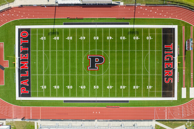 Cheer on the Fightin' Tigers on game night at the Palmetto High stadium.