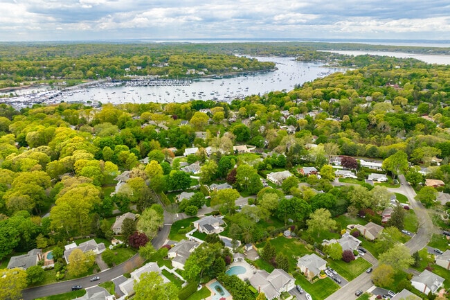 Huntington Harbor can be seen in the distance beyond the neighborhood of Halesite.