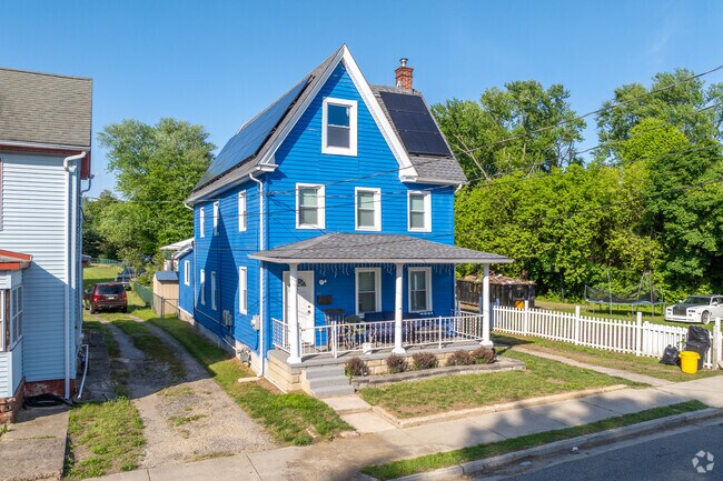 Colorful homes line streets near the river in Carneys Point.