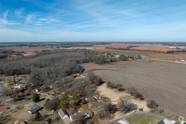 Fields of corn and cotton border the residential areas of Meridianville Alabama.