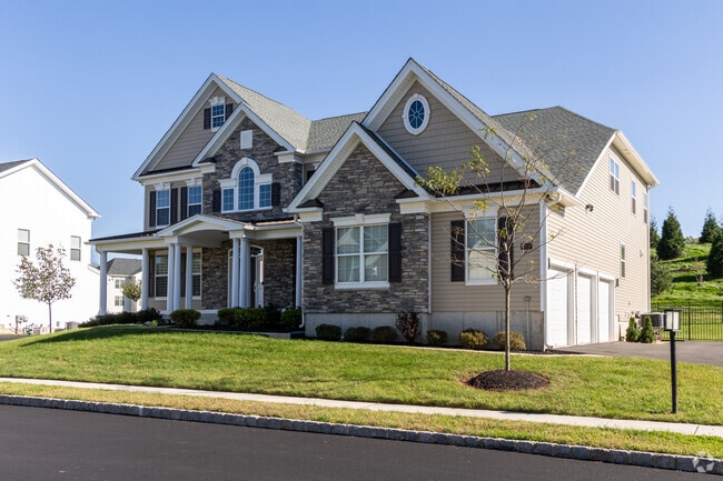 Contemporary homes with three-car garages provide plenty of space for families in Upper Moreland.