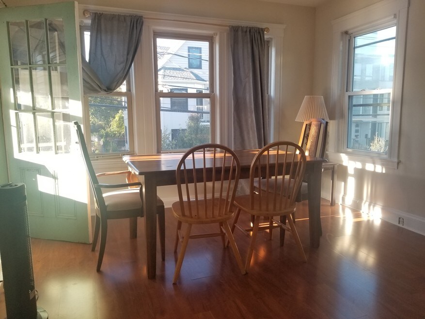 bedroom #1 used as dining room has access to the front balcony