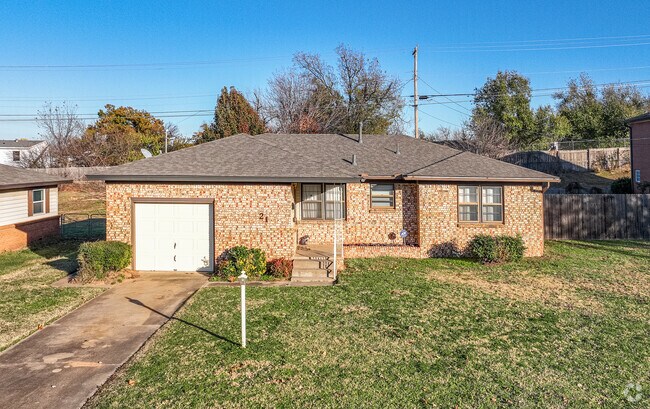 A new, ranch-style home shines in the afternoon sun in Ninnekah.