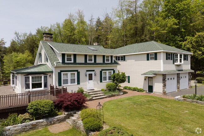 Gabled Colonial offers generous square footage in East Riverton.