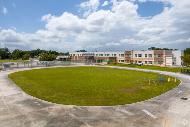 Studen drop off with soccer field at Highlands Elementary School in North Kissimmee