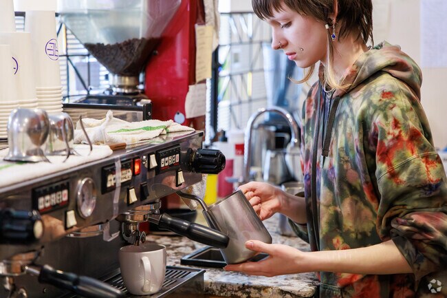 A barista dispenses some coffee at Freedom of Espresso in Camillus, NY.