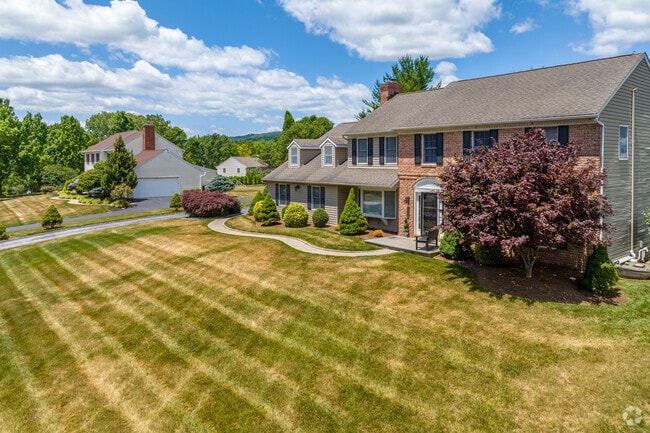 Colonial revivals in Chesterbrook are a gardening enthusiasts dream with pristine landscaping.