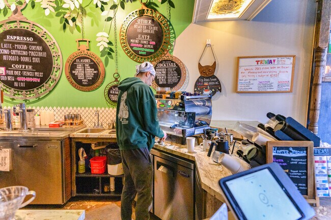 Get a coffee or a non-alcoholic coffee cocktail at Blue Owl Coffee in Old Town, near Old Forest.