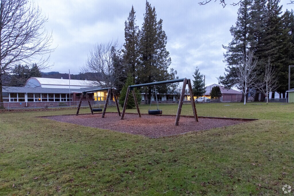 Wind River Middle School play area features swings in the middle of the campus.