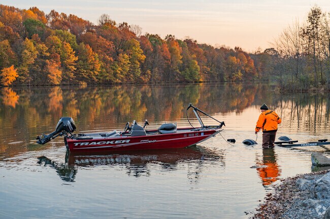 A man and his boat. enjoying one of many amenities Kaercher Creek Park has to offer.