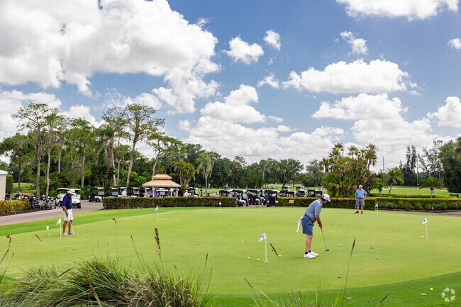 Golfers can perfect their shots on the practice greens in Imperial Golf Estates.