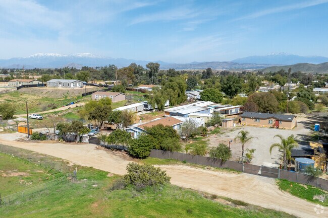 cluster of Ranch-style homes in Meadowbrook features spacious, single-story living with wide yards, blending rustic charm and modern comfort in a peaceful suburban community.