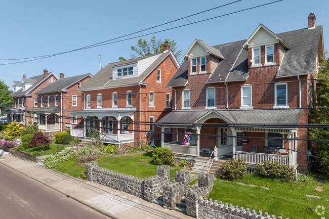 Historic brick twin homes are common in Franconia Township.