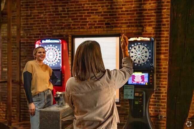 North River Fronts residents hit the game room at The Livery.
