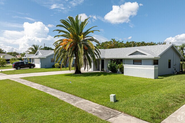 Palm trees adorn homes in the Southwind Lakes neighborhood.