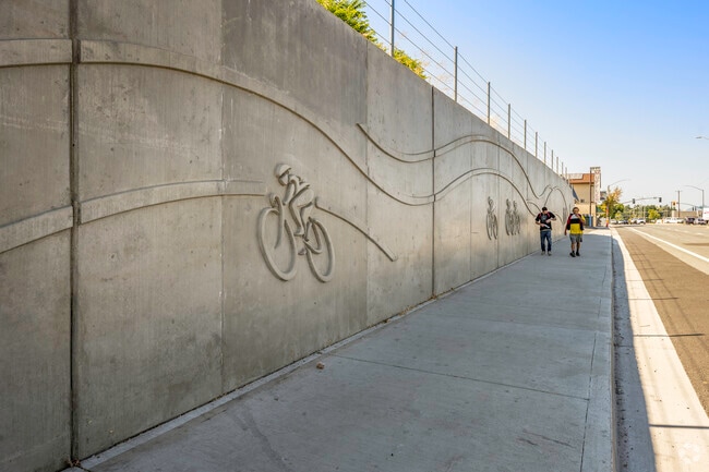 Along South Market Street is a cement mural of bikers in Country Heights.