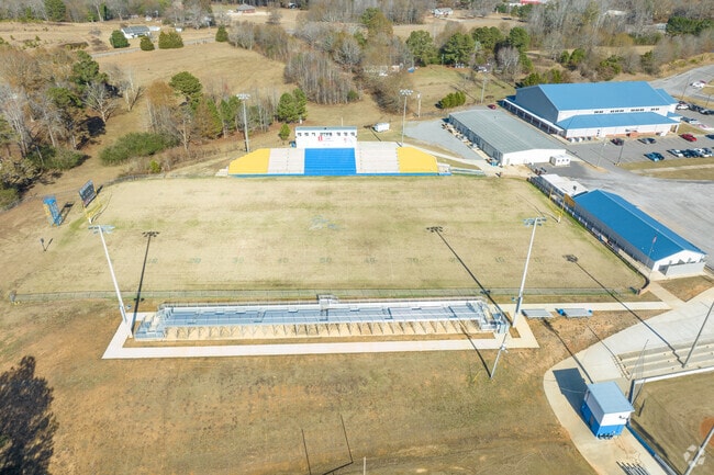 Cheer on the football team at Curry High School.