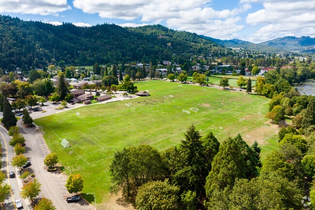 Expansive grass fields at Fir Grove Park are perfect for a soccer match.