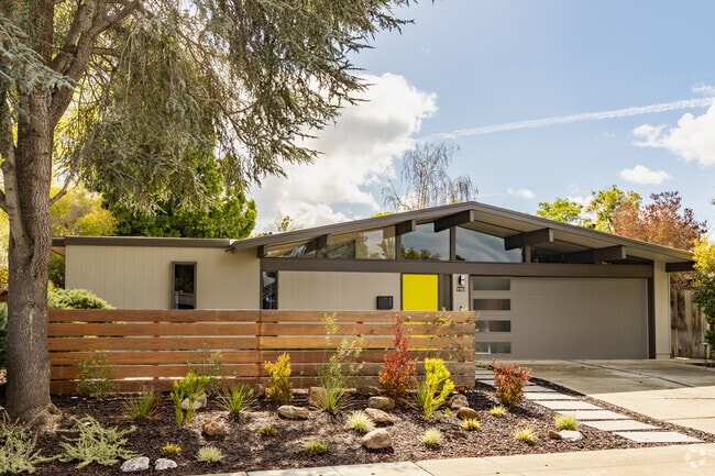 Mid-century homes usually have a bright colored front door in the Birdland neighborhood.