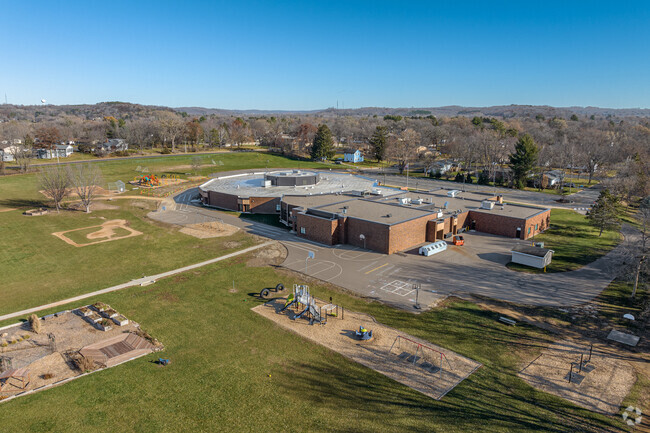 Westside Elementary has a large campus in River Falls featuring multiple playgrounds.