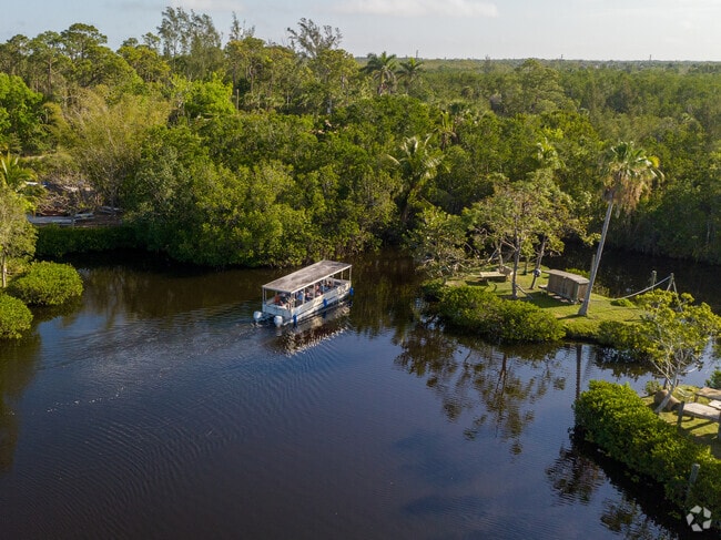Guests of the Naples Zoo take a boat ride around primate island where they can see the monkeys.