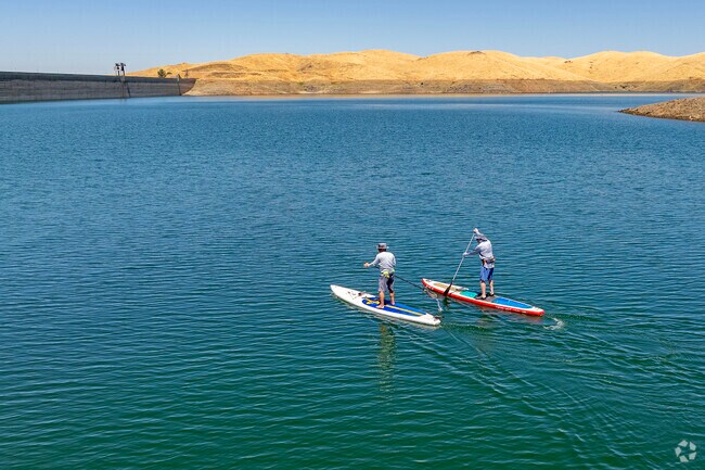 Paddle boarding is a popular activity on Millerton Lake near Bonadelle Ranchos.