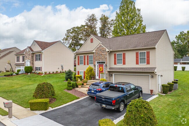 Traditional homes in Conestoga Woods typically sit on sizable lots.