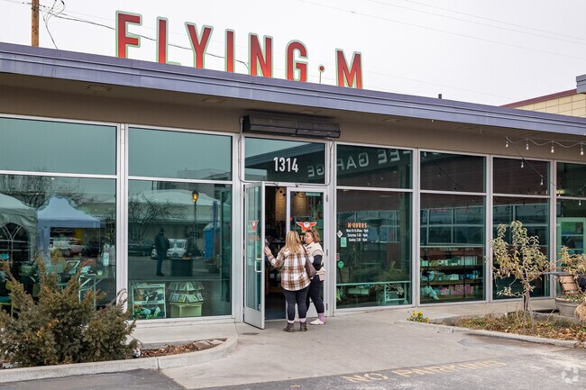 Shoppers step inside to warm up after shopping the Hip Holiday Market in Nampa.